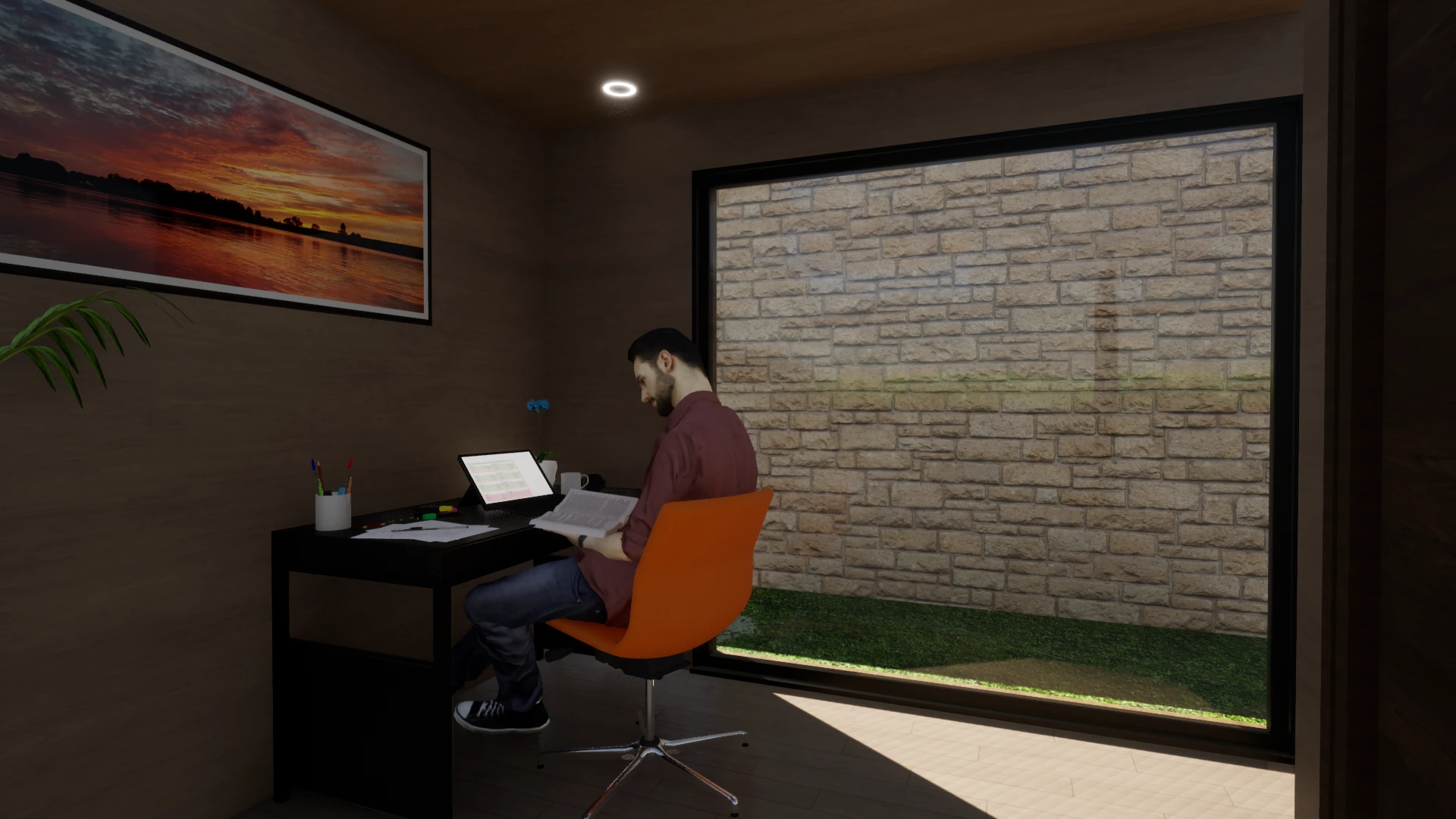 Intérieur d'un bureau de jardin avec poste de travail face à une grande baie vitrée