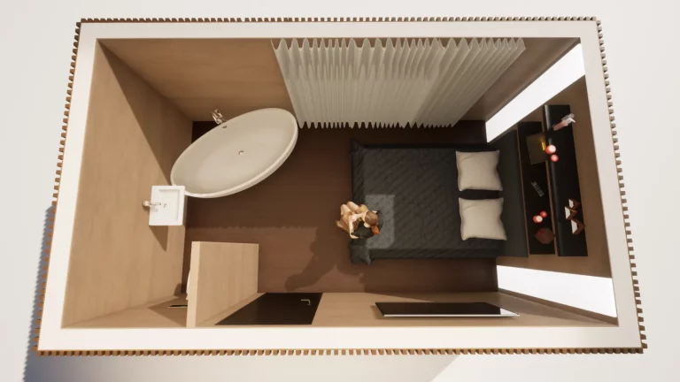Vue en coupe d'un studio de jardin aménagé avec lit, coin salon et salle d'eau